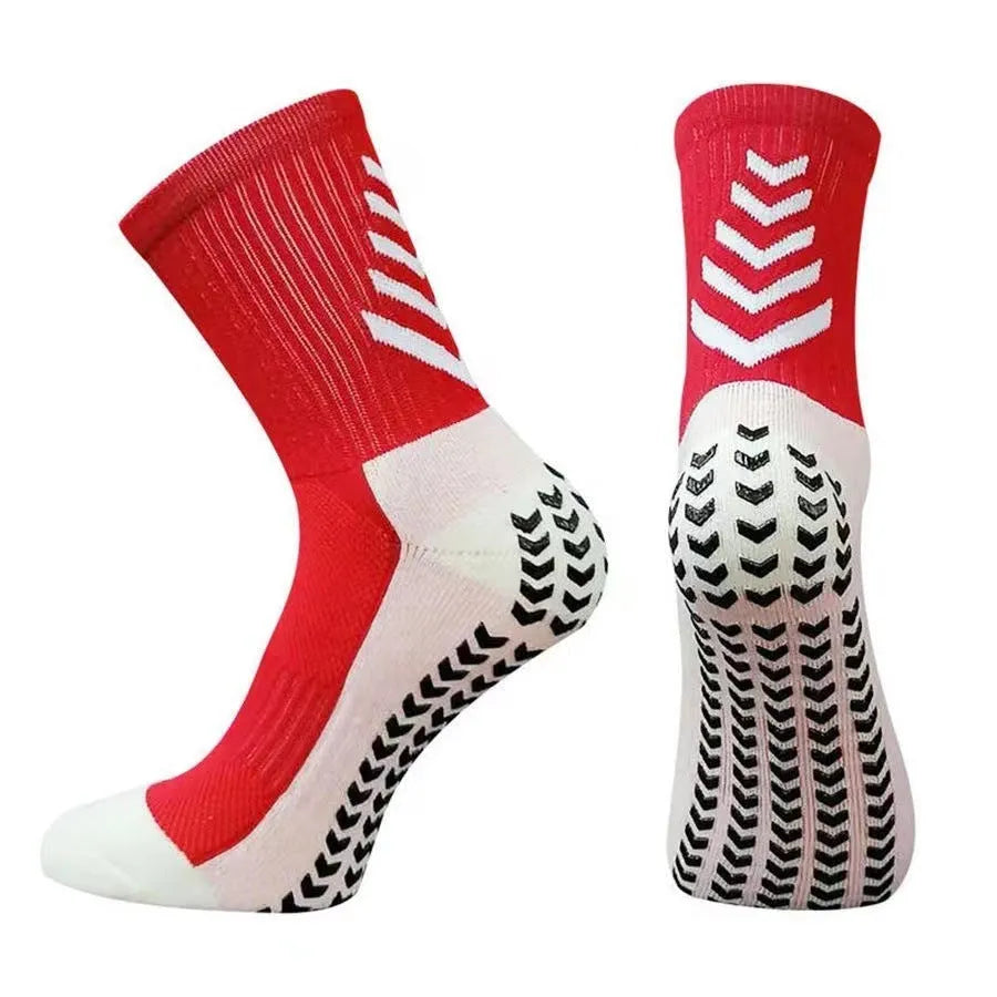 Men's black and green mid-calf athletic socks with a geometric pattern and non-slip silicone grip.