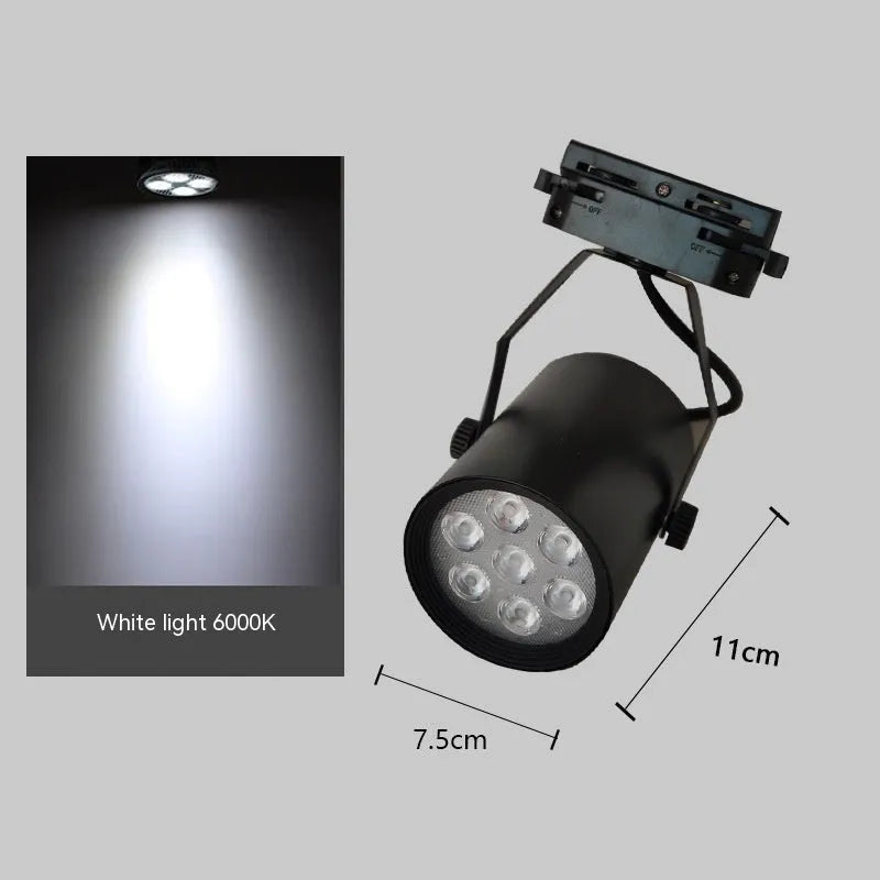 LED track spotlight with black aluminium shell mounted on lighting track