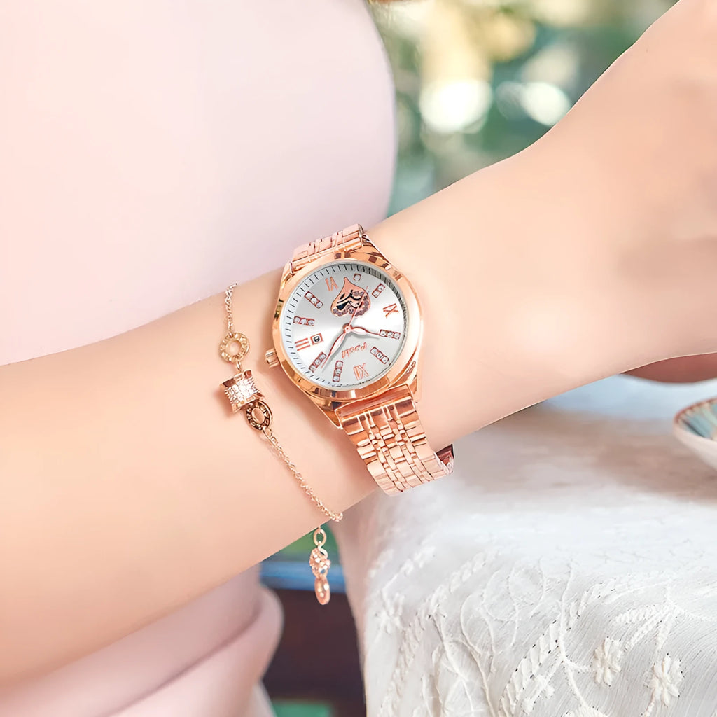 Women's casual alloy strap watch with Roman numeral rhinestone dial, luminous hands, and calendar window