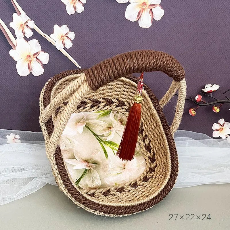 Hand-woven natural straw basket in a rustic style, measuring 19cm by 12cm.