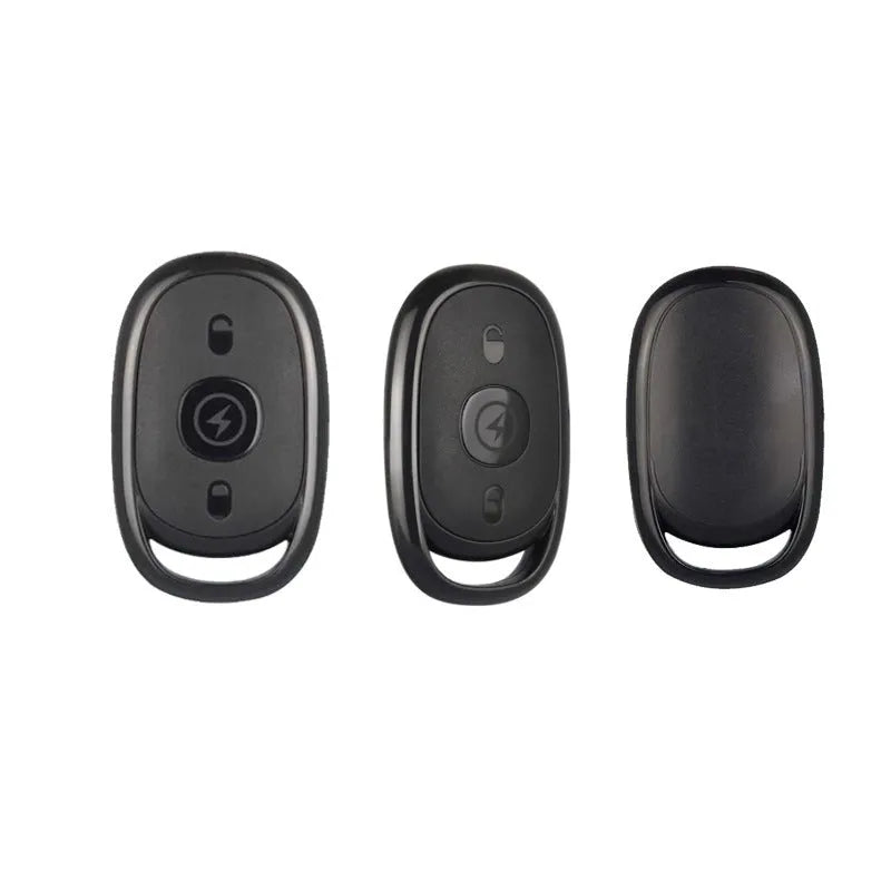 Black ABS plastic electric car remote control duplicator with buttons, shown alongside a CR2032 battery.