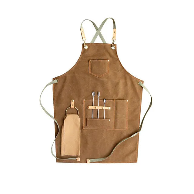 Canvas apron with cross-back straps in camel colour