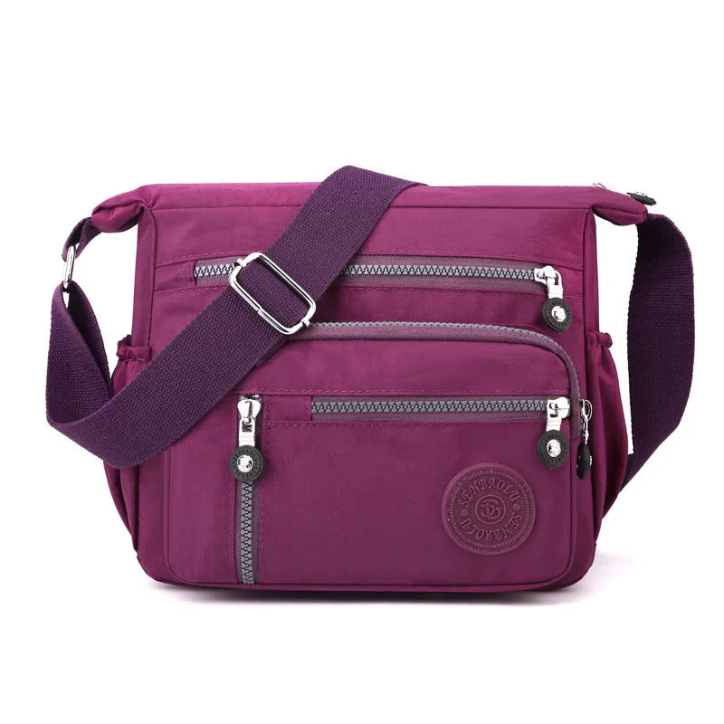 Soft nylon messenger bag in square vertical shape with single shoulder strap