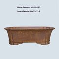 Large rectangular purple sand flowerpot on floor next to smaller size option.
