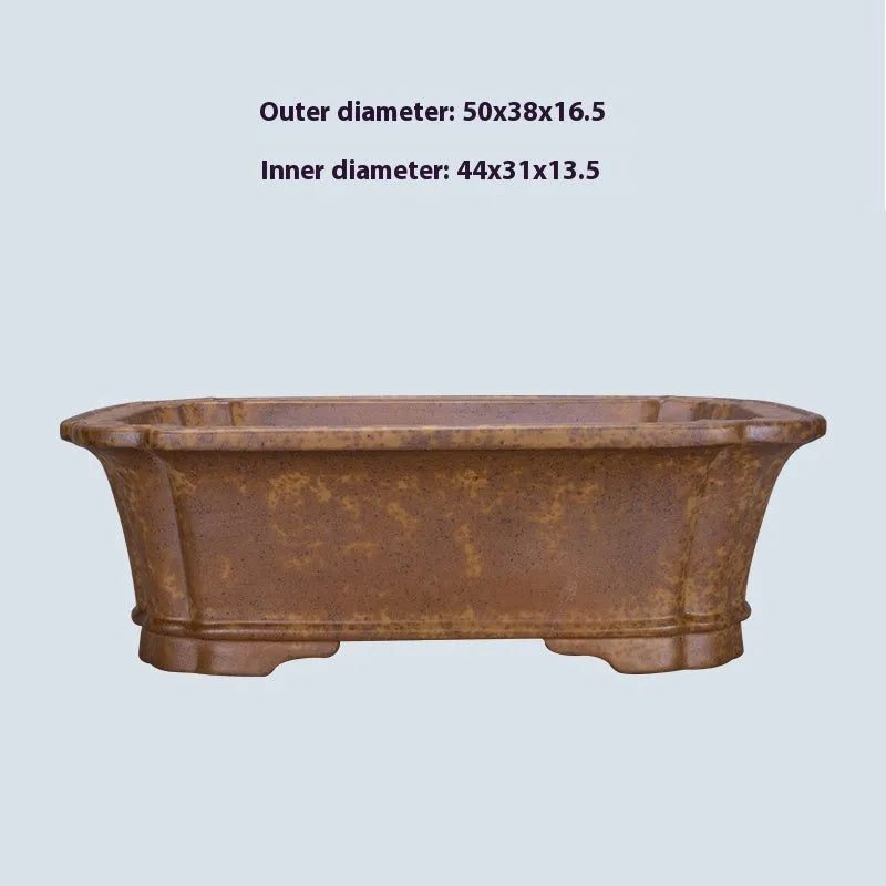 Large rectangular purple sand clay flowerpot with modern simple design on a floor.