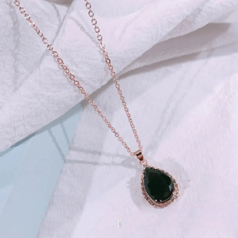 Women's drop shape necklace with geometric rhinestone pendant in multiple colour options