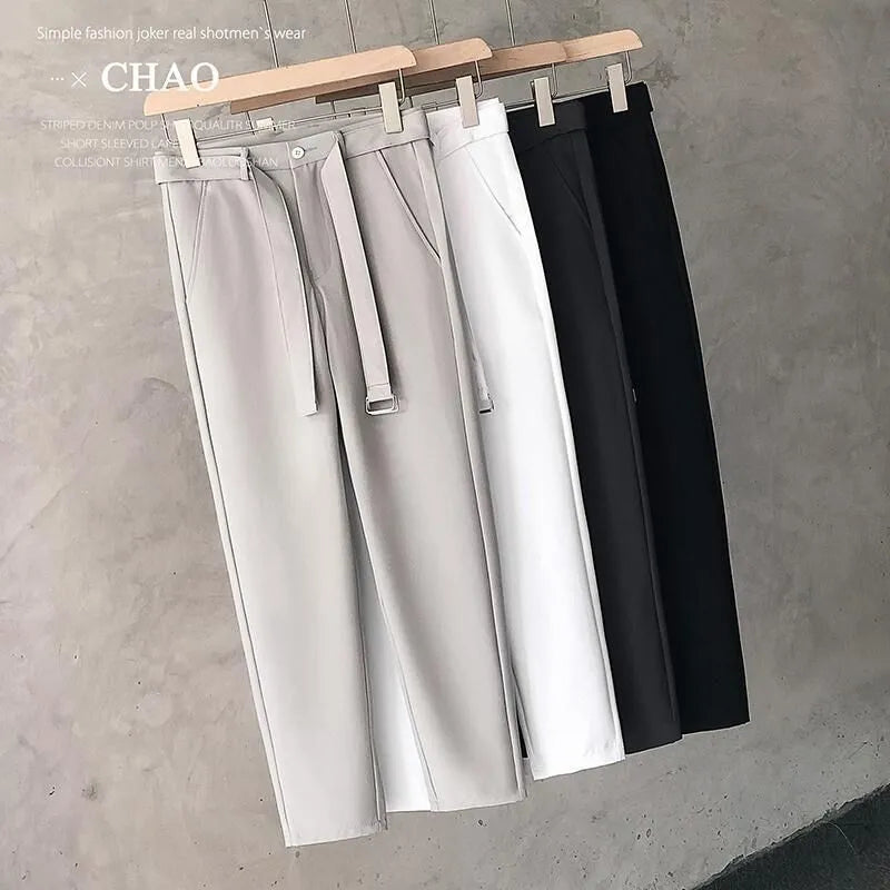 Boys slim straight wool trousers with tapered fit and belt loops in business casual styling