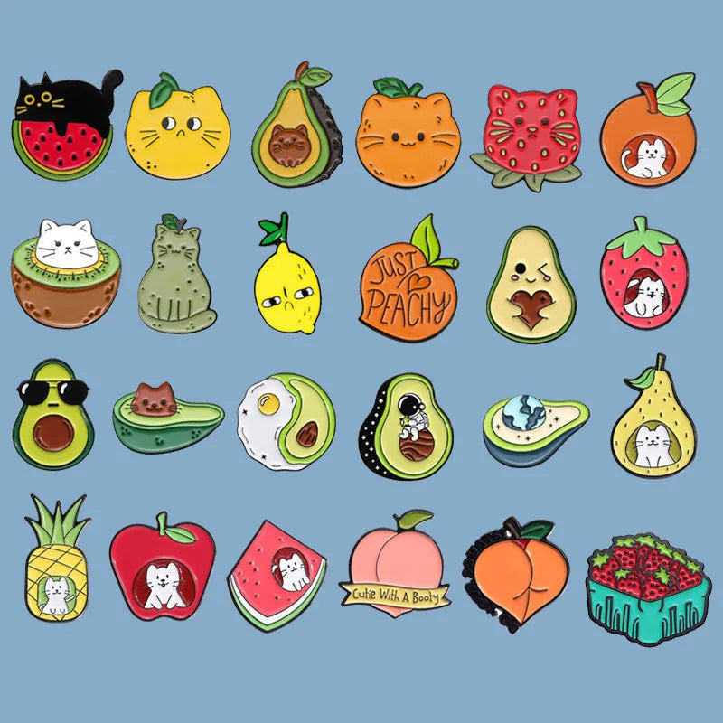 Colourful cartoon fruit design metal brooch with a silver pin fastener on the back.