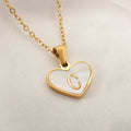 Gold-plated heart necklace with white shell centre and personalised letter pendant on 45cm chain