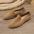 Handmade grey low-top men's casual sneakers with cowhide leather upper and rubber sole