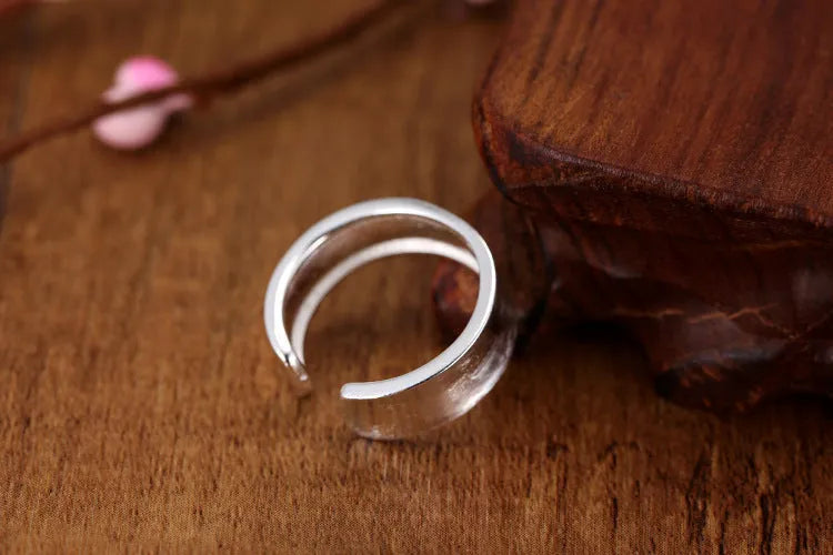 Frosted sterling silver open ring with geometric design and adjustable opening