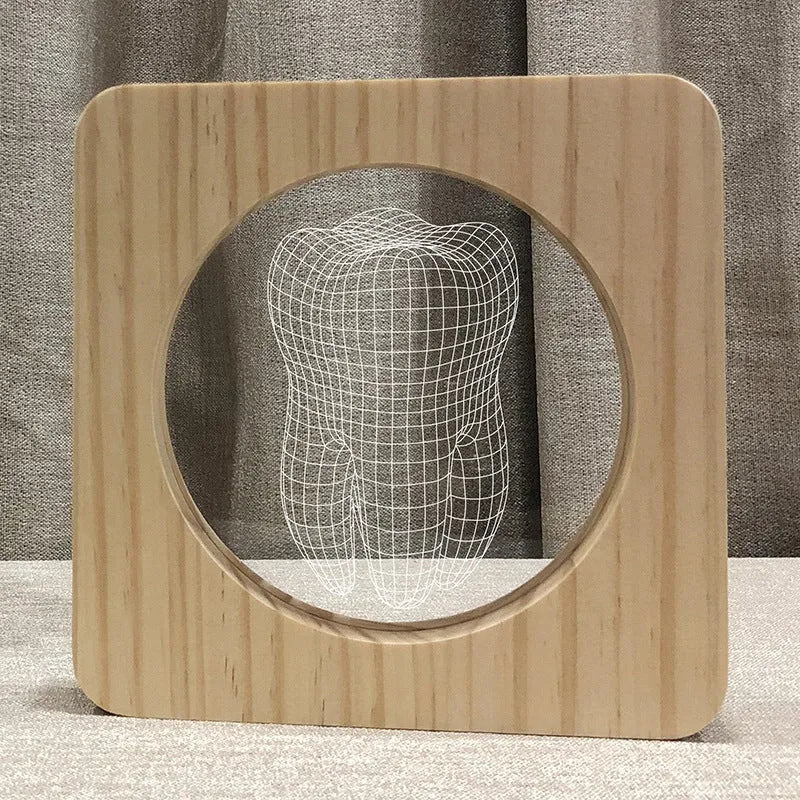 Small tooth-shaped acrylic night lamp in wood colour finish with USB cable