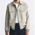 British style long sleeve suede velvet jacket in mink colour on a hanger.