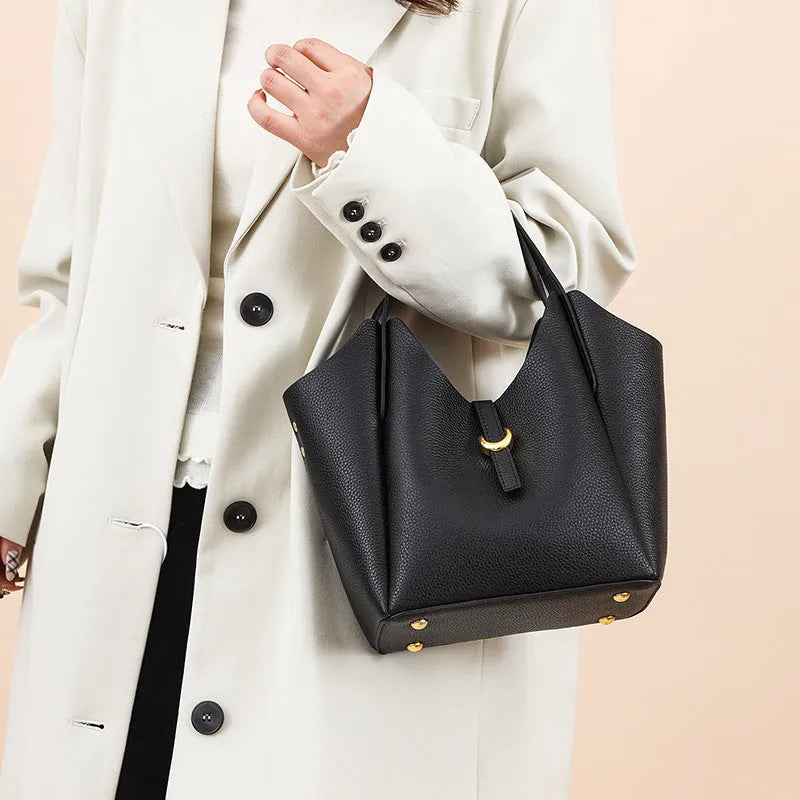 Genuine leather women's retro bucket bag with hand holding design in black, beige, khaki or lake blue colour