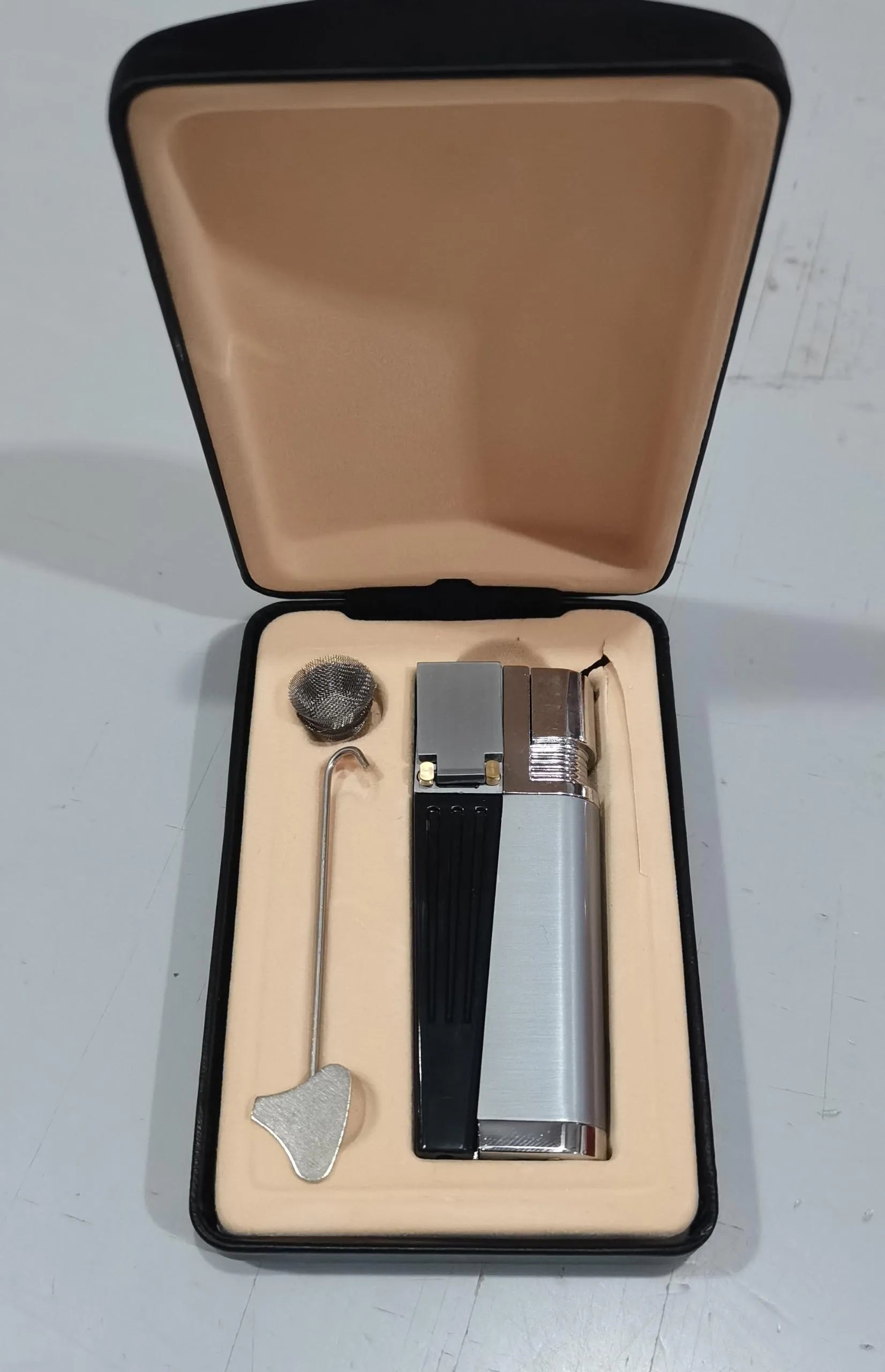 Foldable metal pipe lighter showing stash compartment and lighter mechanism in zinc alloy construction