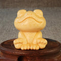 Solid bamboo smiling frog carving ornament measuring 5cm high with cartoon cute style