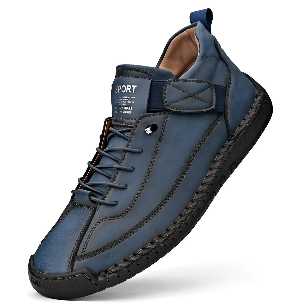 Men's mid-calf Martin boots in khaki with visible tooling stitching and an elastic band across the instep.