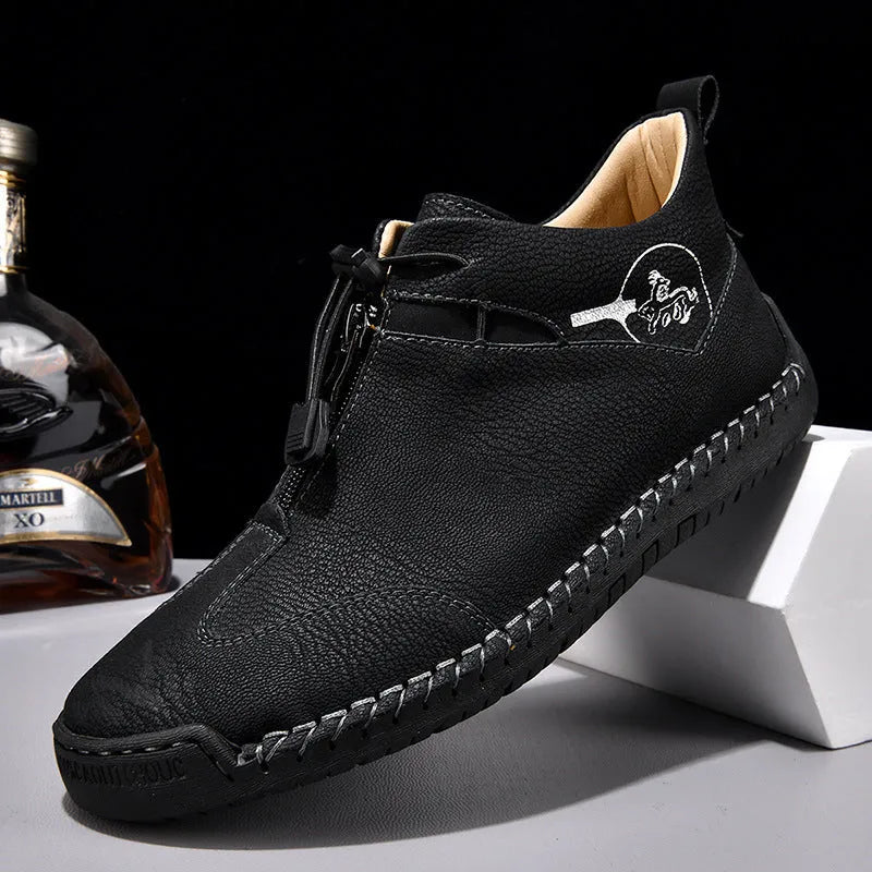 Men's casual leather shoes in black with round toe and mid heel height