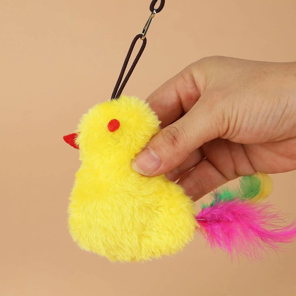 Interactive cat toy hanging from door frame with treat bulb and dangling mouse