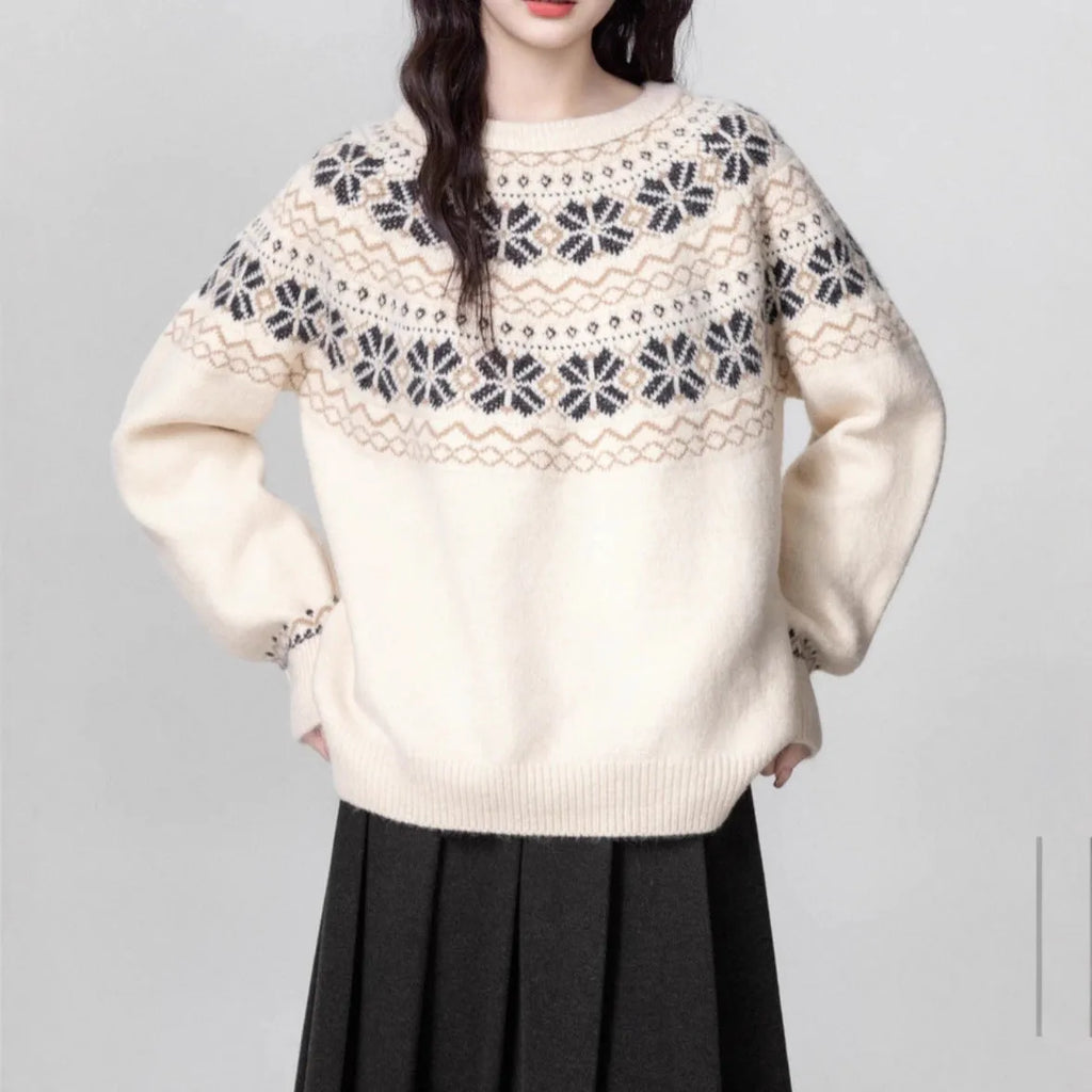 Women's Milky White vintage Fair Isle geometric knit pullover sweater on a hanger.