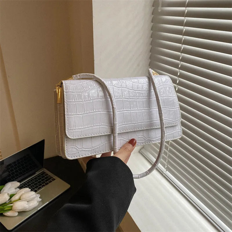 Small portable shoulder messenger bag in hard box shape with stone pattern finish