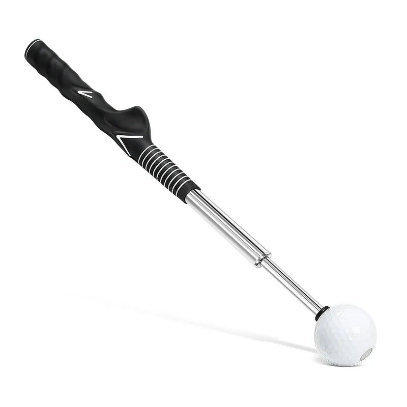 Telescopic stainless steel golf swing trainer simulator on a green background.