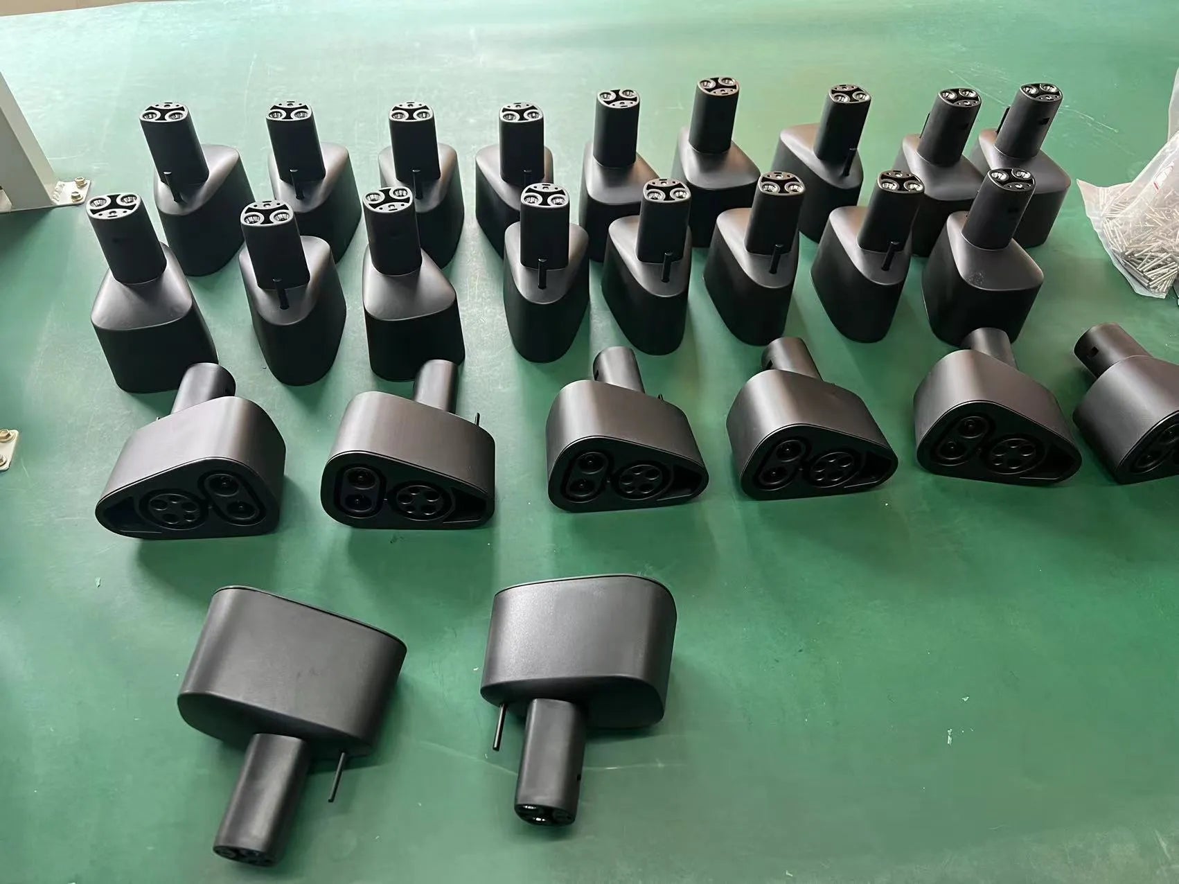 Black Tesla charging plug conversion adapter with PC+nylon shell.