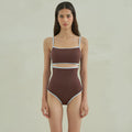 Brown women's one-piece triangle swimsuit made from nylon fabric on a mannequin.