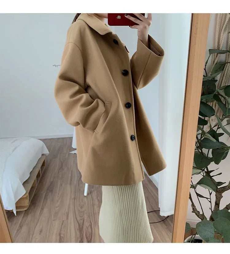 Women's Korean-style loose overcoat in solid colour with long sleeves, available in khaki or black