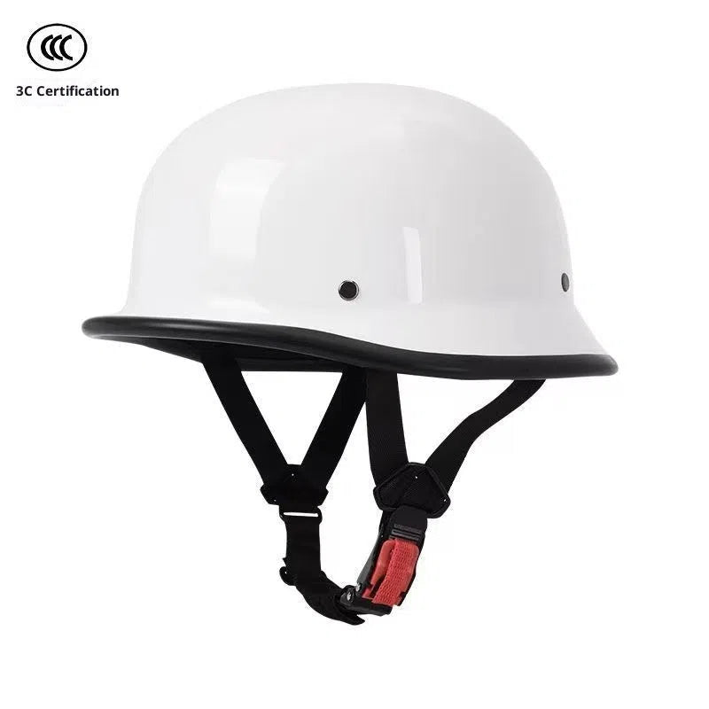 Men's retro motorcycle helmet in matte black ABS construction, side view on white background