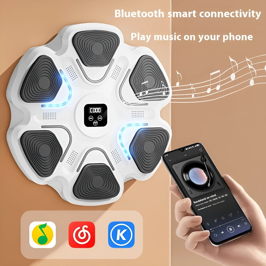 Smart music boxing machine wall target with LED lights and focus gloves on white wall.