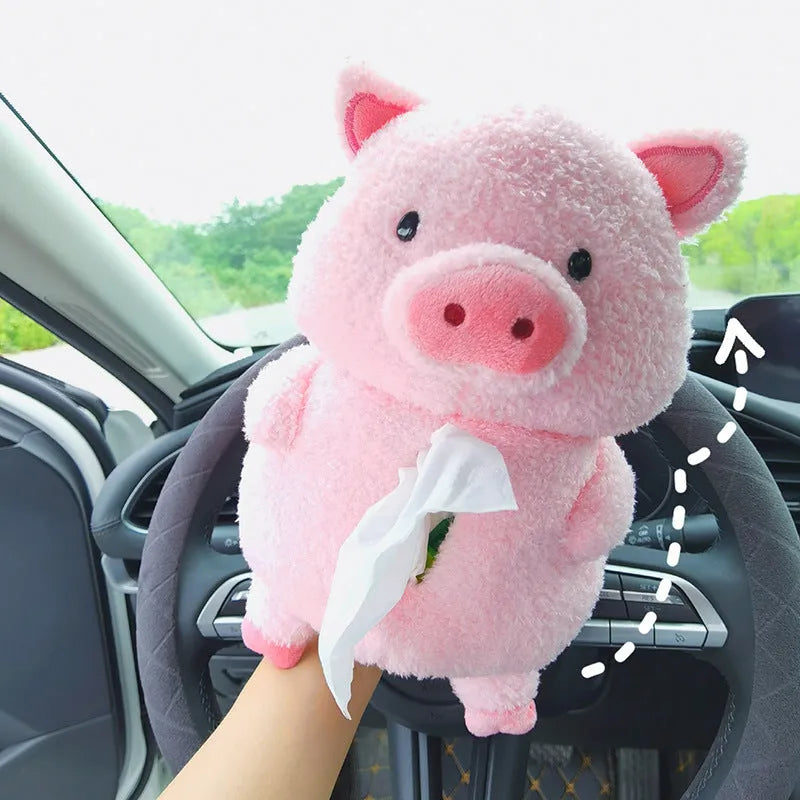 Soft plush car tissue box cover in a cartoon lamb design on a car seat.