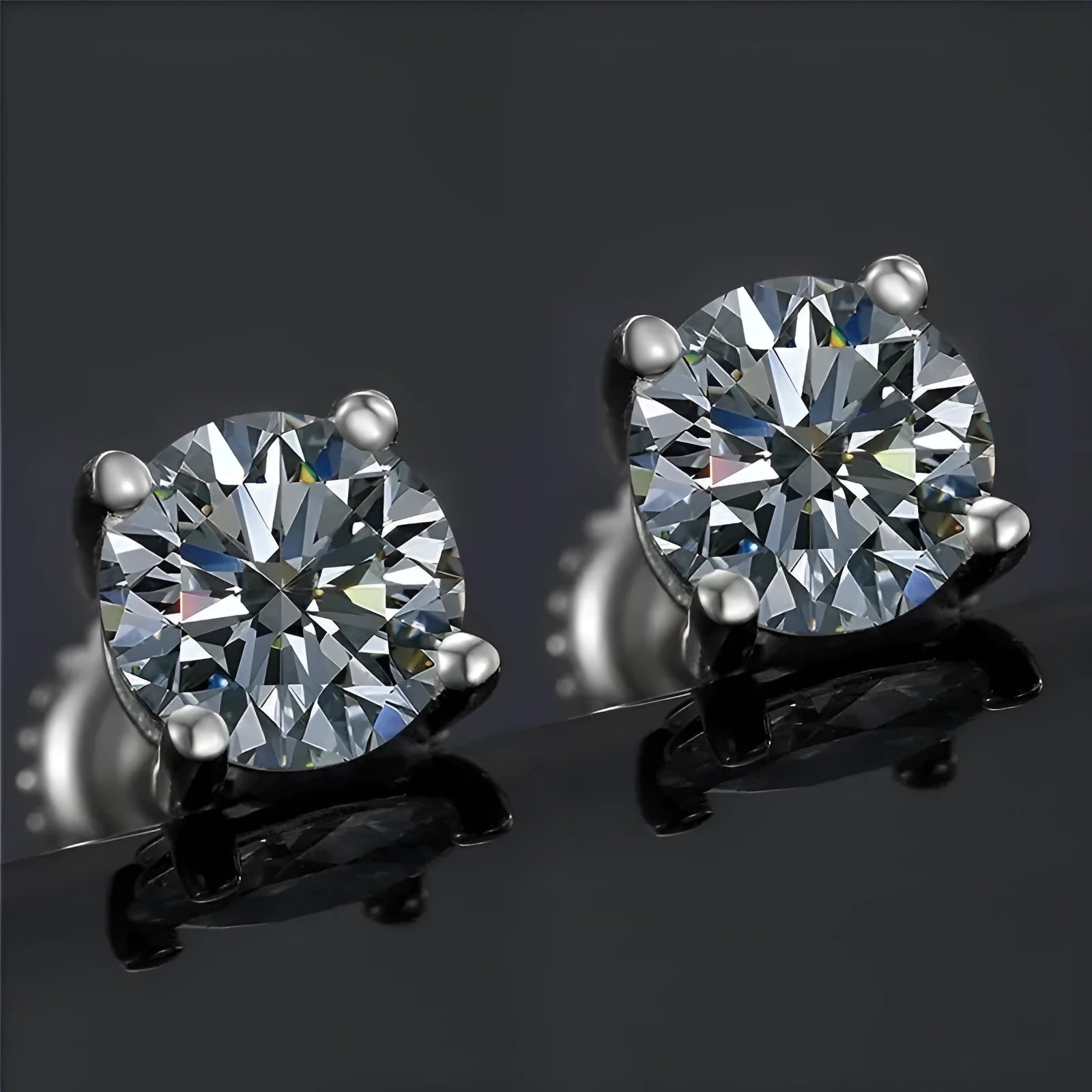 Women's silver moissanite screwback stud earrings with geometric shape and four-claw setting