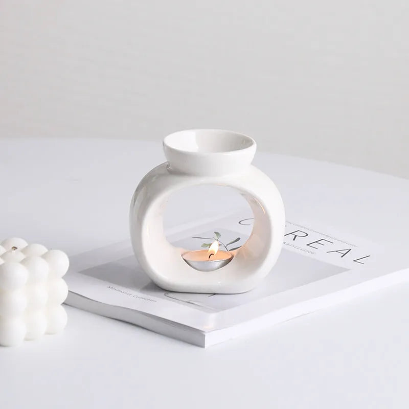 White Nordic style ceramic aromatherapy stove ornament with anti-dry burning design