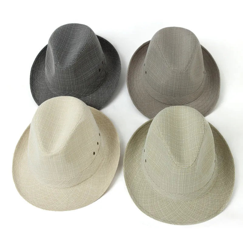 Classic brown fedora hat with structured crown and wide brim on a wooden stand