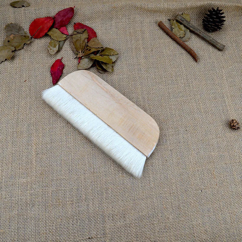 Wool brush for mounting paste application on artwork boards