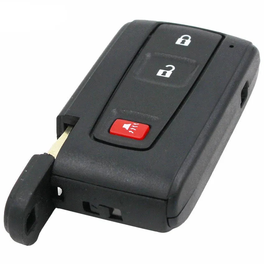 Black plastic car key shell replacement with small copper key blade measuring 70x38x20mm