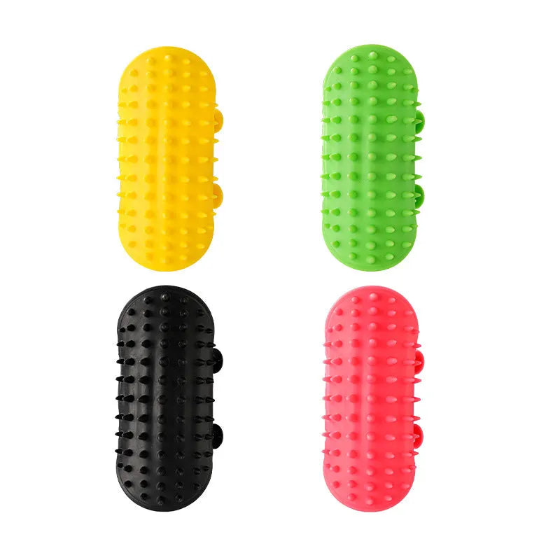 Silicone cat grooming comb with adjustable strap mounted on a furniture leg