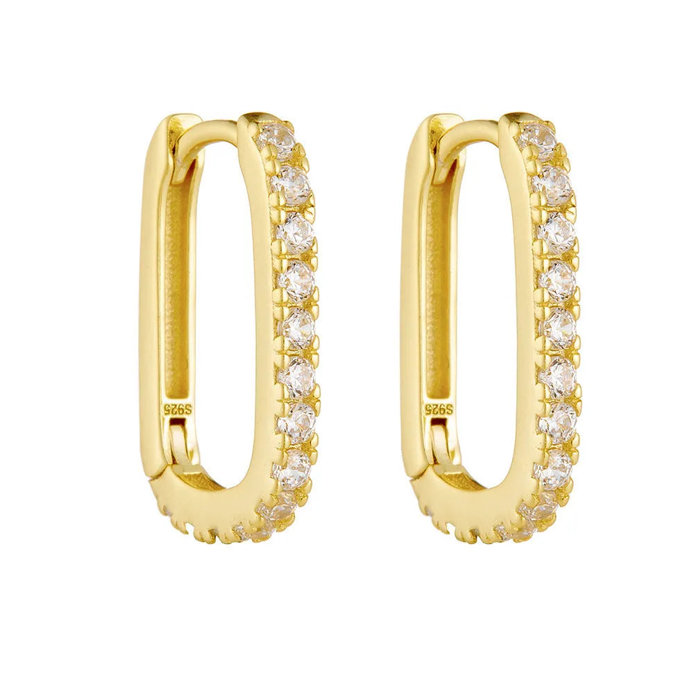 Sterling Silver oval geometric zircon ear clip earrings for women on a white background.