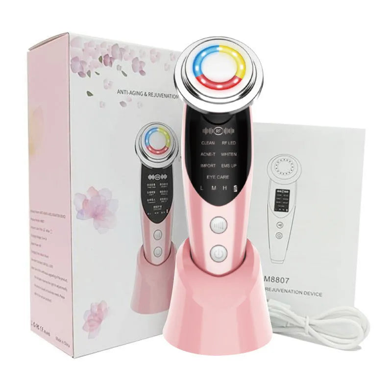 Seven-mode EMS iontophoresis beauty instrument in pink with USB charging cable