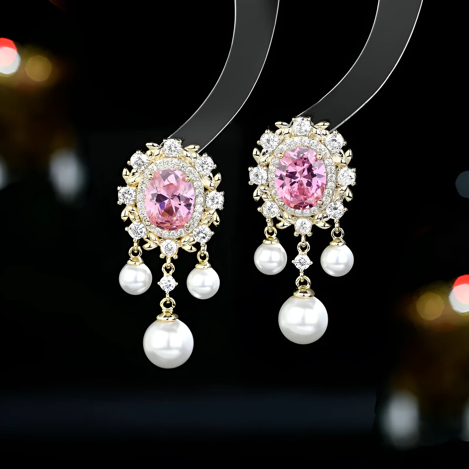 Oval geometric earrings with zircon inlay and tassel detailing in light purple colour