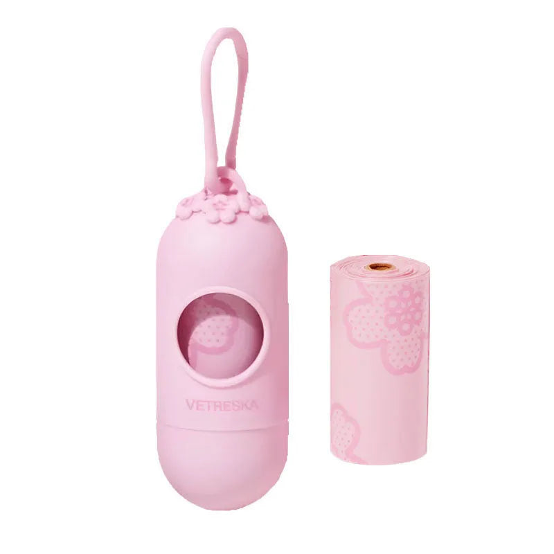 Portable dog poop bag capsule with scented inner bags in strawberry, orange, and cherry blossom styles.