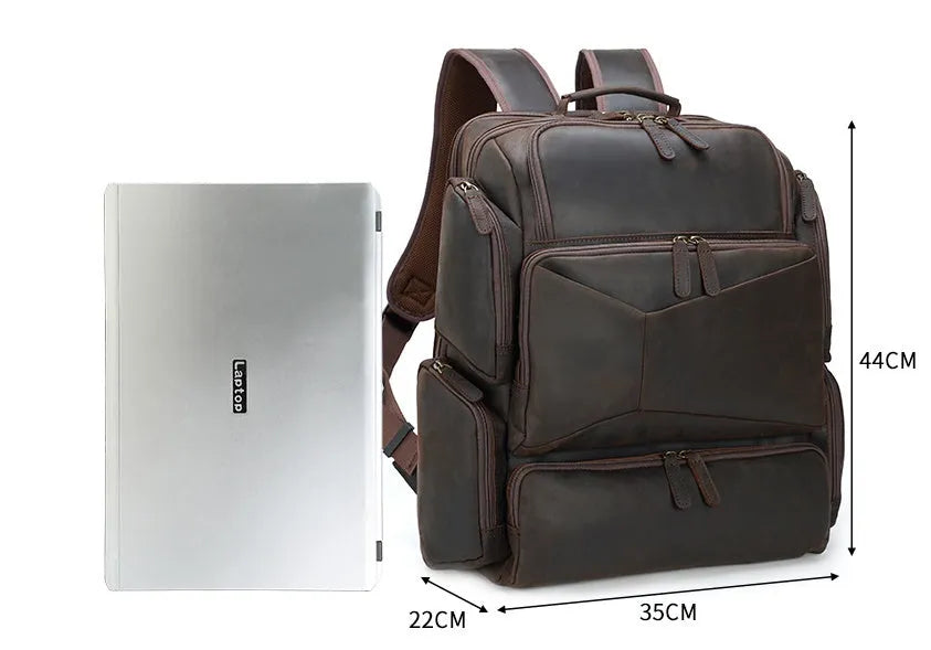 Dark brown genuine leather backpack for men showing embossed texture, double straps, and open compartments.