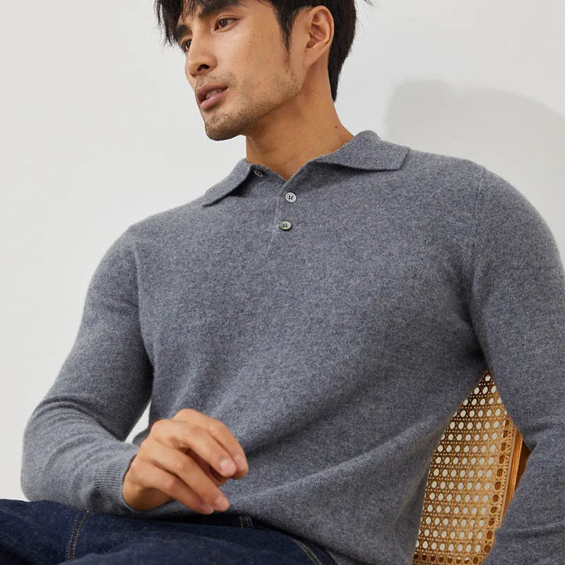Man wearing a sapphire blue short sleeve cashmere pullover with a polo collar.