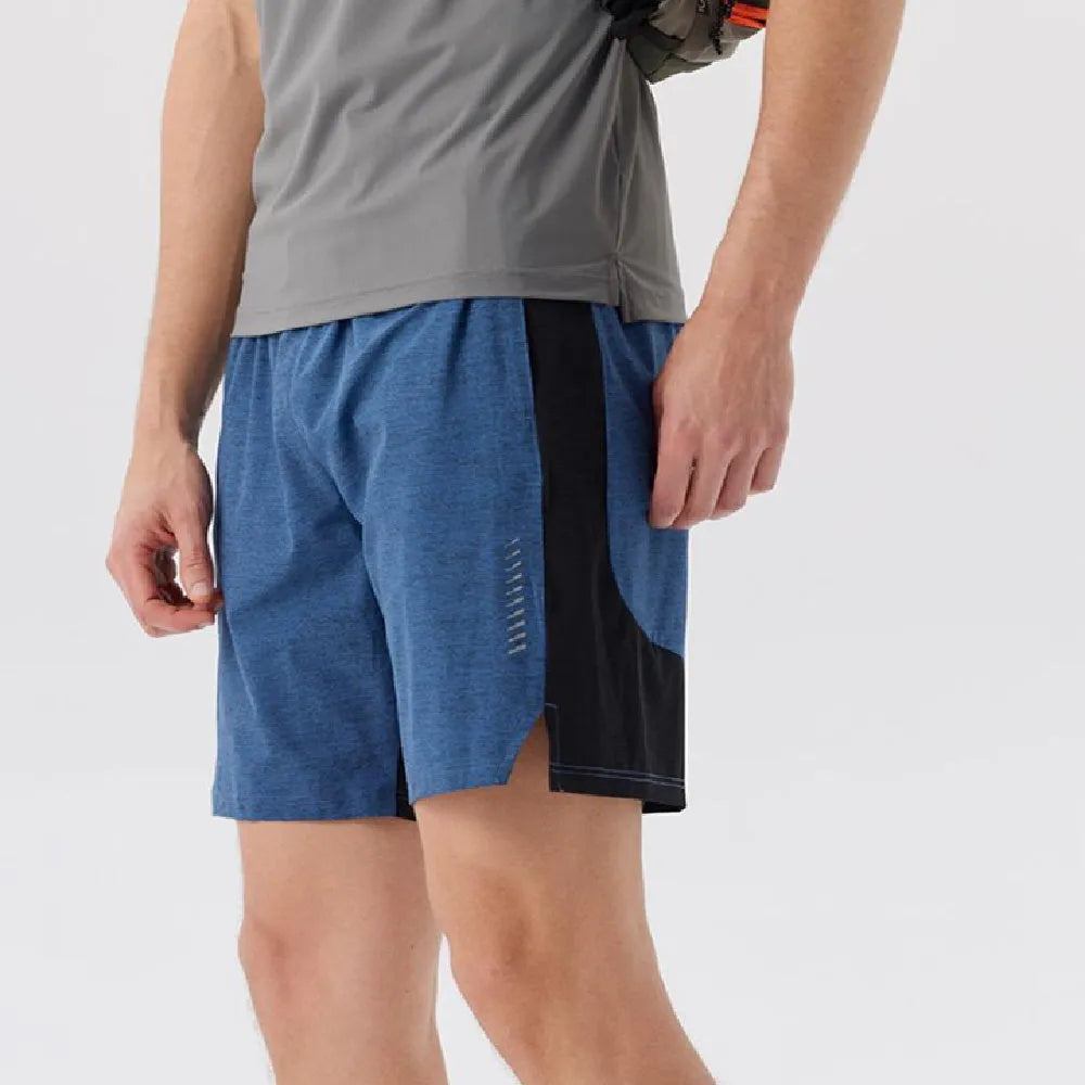 Men's forest green five-point spandex shorts on a mid waist