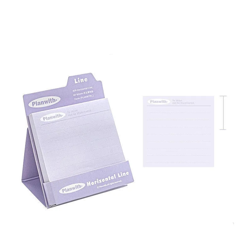 Portable standing Post-it notes in green blank, purple line, blue blank, and gray line colours