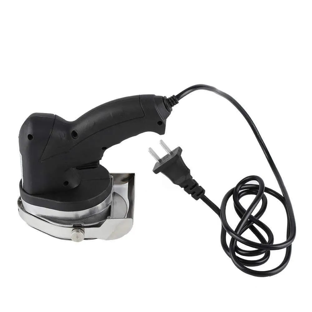 Black KS-100E electric meat cleaver with thickness adjustment dial for turkey and barbecue prep.
