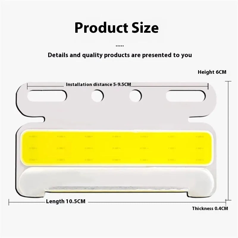 Aluminium alloy COB LED truck side light projecting bright white light onto ground next to tyre.