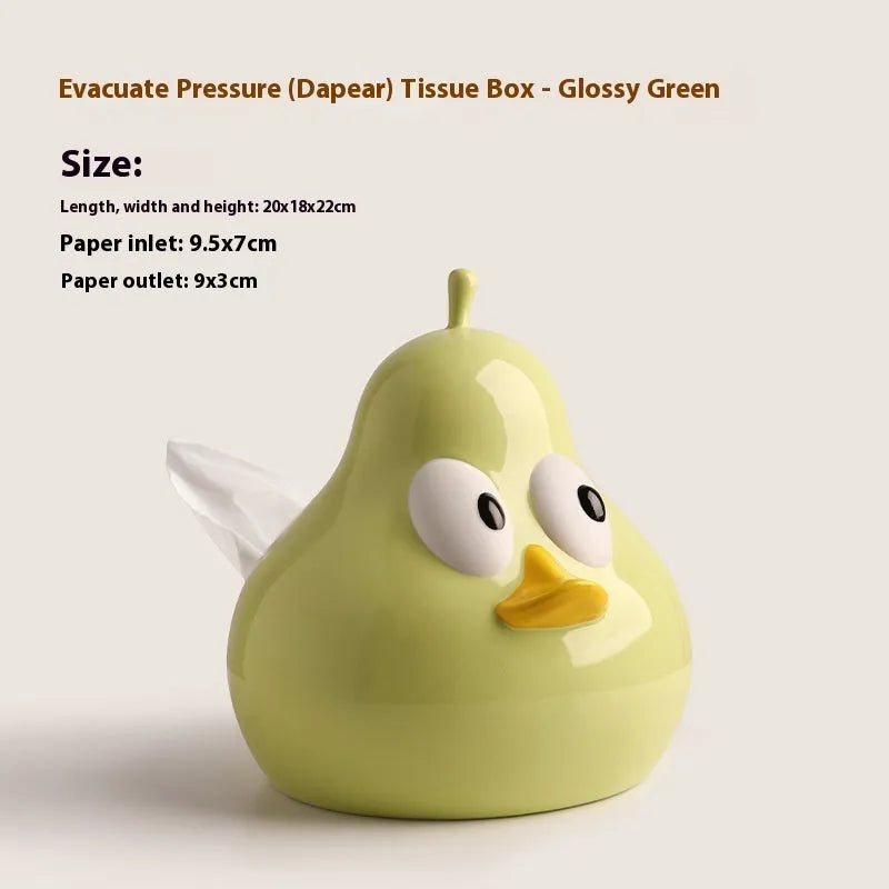 Green ceramic tissue box with cute pear design for living room or desktop.