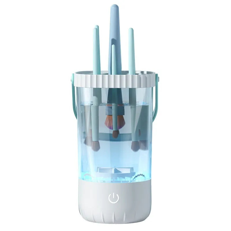 White rechargeable electric makeup brush cleaning tool with data cable.